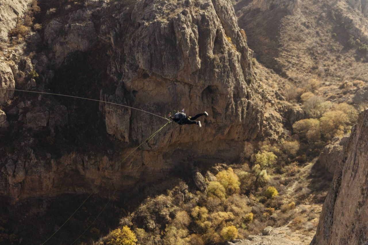Guest enjoying a rope jumping adventure in Armenia